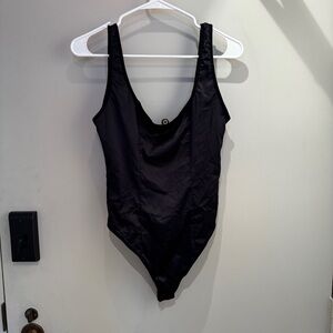 Black free people thong body suit.
